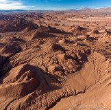 Aerial view of Desierto del Diabolo, an eroded desert of clay mountains, Argentina