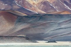 Amazing tones and colors at Salar de Aguas Calientes, mountains at the altiplano of Atacama Chile