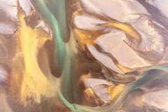Abstract shapes of sediment laden glacial rivers and volcanic landscapes in Iceland