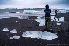 Waiting for the right wave at Diamond beach, Iceland