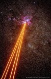 The four laser beams of Paranal Observatory shooting at the Carina Nebula