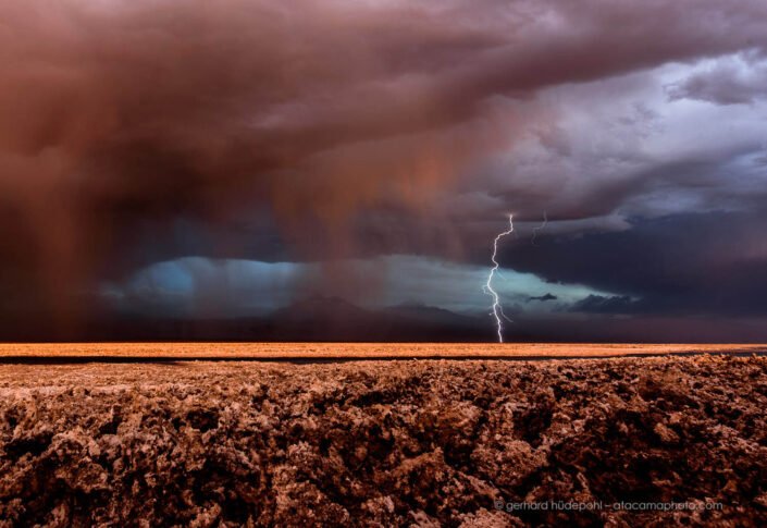 Unusually heavy thunderstorm and lightning above Salar de Atacama salt flat.