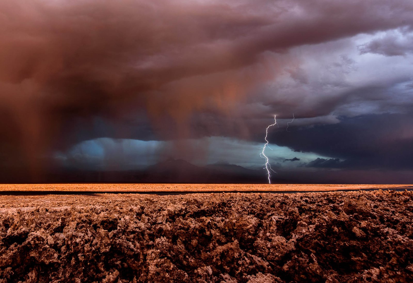 Unusually heavy rain and lightning above Salar de Atacama salt flat.