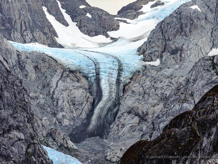 Glacier Nena with central moraines at Alakaluf fjord, Parque Nacional Alberto de Agostini