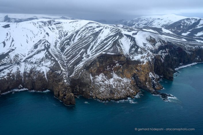 Aerial photo of volcanic Deception Island in Antarctica