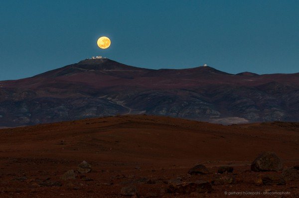 Full moon setting above the VLT Observatory Paranal, Chile